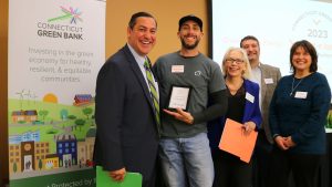 VP of Operations Mike Sobiesiak accepting the Connecticut Green Bank's Energy Storage Solutions award in 2024